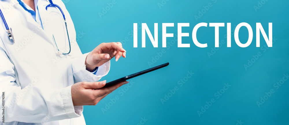 Infection theme with a doctor using a tablet computer Infection theme with a doctor using a tablet computer