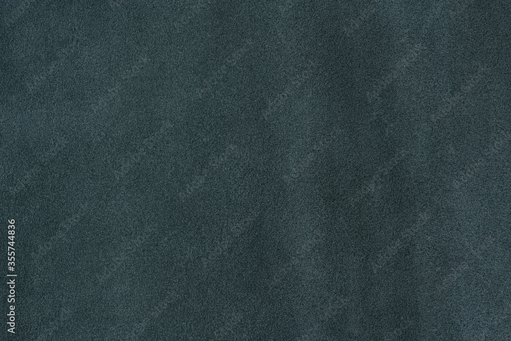 Old teal leather texture background. closeup view of suede