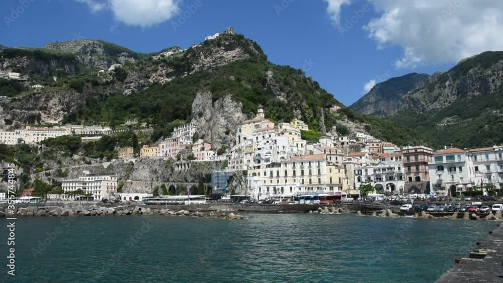 Panoramic view of the town of Amalfi on the coast of the Campania region. Panoramic view of the town of Amalfi on the coast of the Campania region.