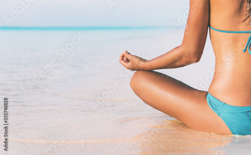 Meditation zen woman meditating on beach. Nature healthy lifestyle happy yoga girl.