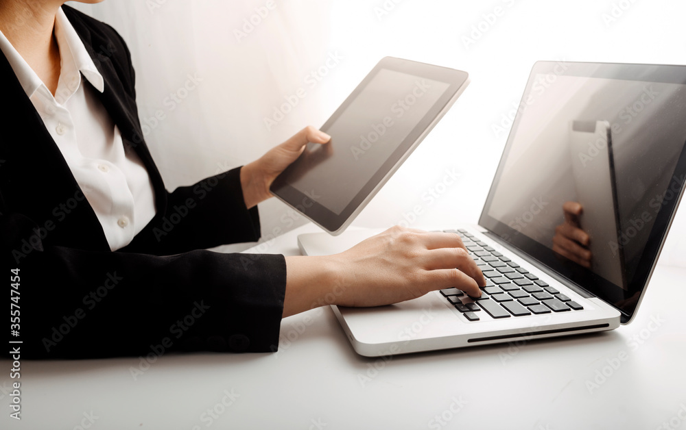 businessman hand working with new modern computer and writing on the notepad strategy diagram as concept morning light businessman hand working with new modern computer and writing on the notepad strategy diagram as concept morning light