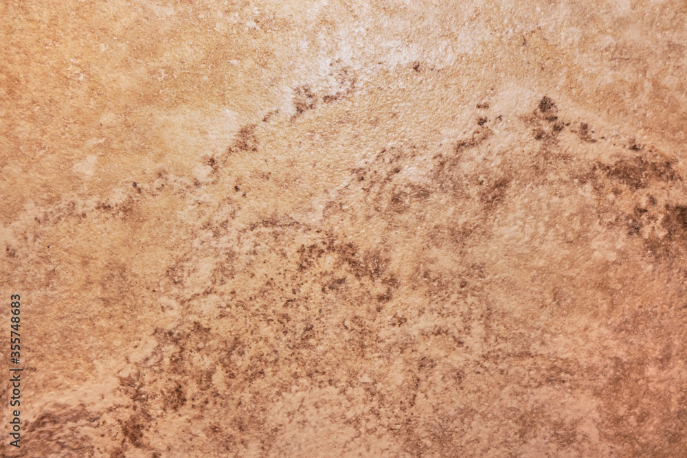 Brown marble texture for design pattern artwork background. The texture of the wall with cracked beige marble background.