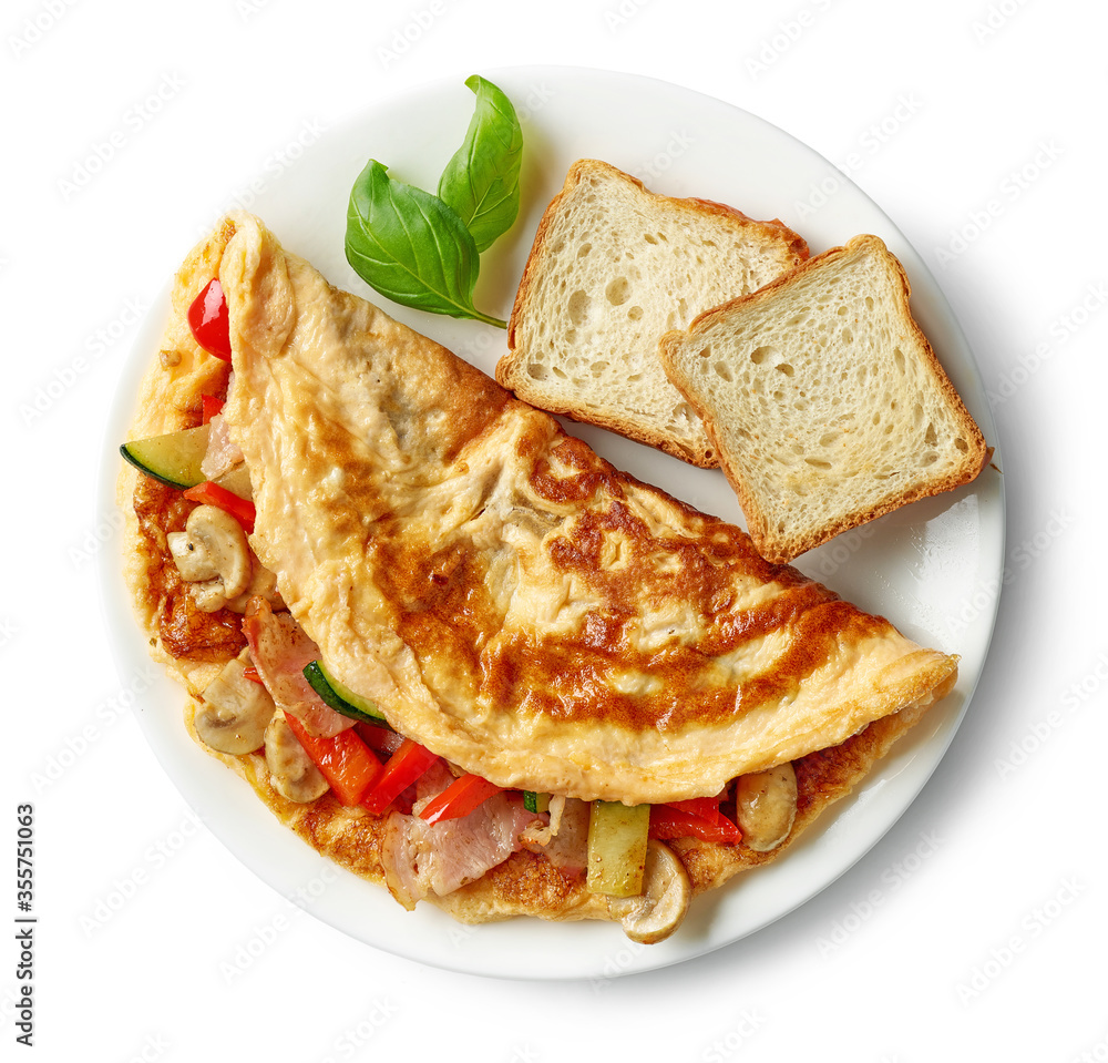 omelette stuffed with vegetables and ham