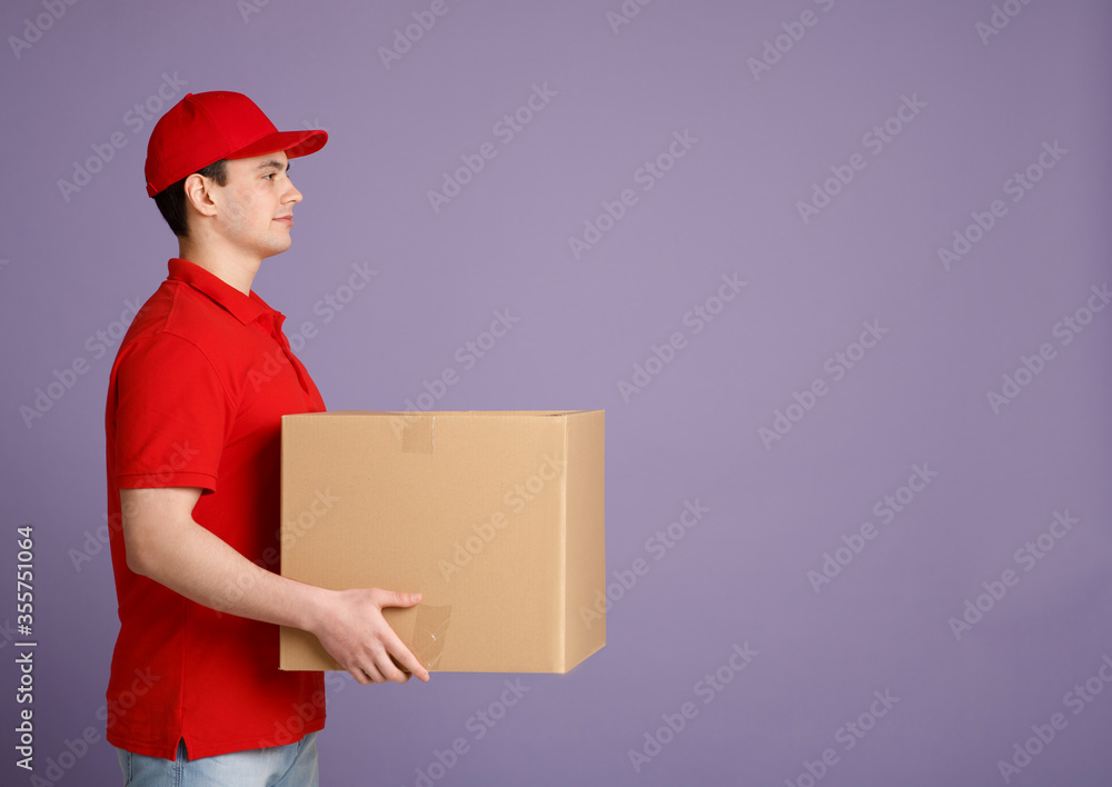 Waiting for parcel at home. Courier delivered big cardboard box to door Waiting for parcel at home. Courier delivered big cardboard box to door