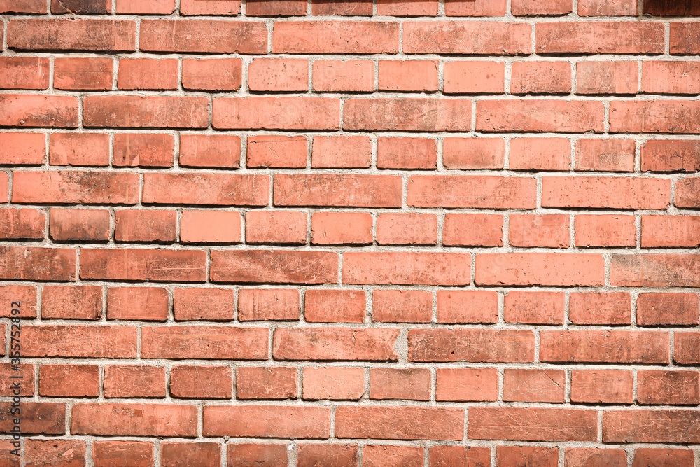 Fototapeta premium Brickwork wall under sun light