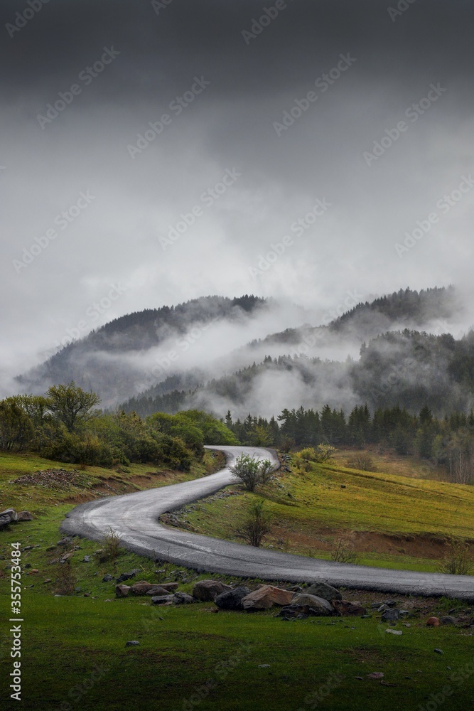 Village thailand with foggy landscape mountains misty forest with tree and house in the moring winter nature / View of foggy house on hill countryside Village thailand with foggy landscape mountains misty forest with tree and house in the moring winter nature / View of foggy house on hill countryside