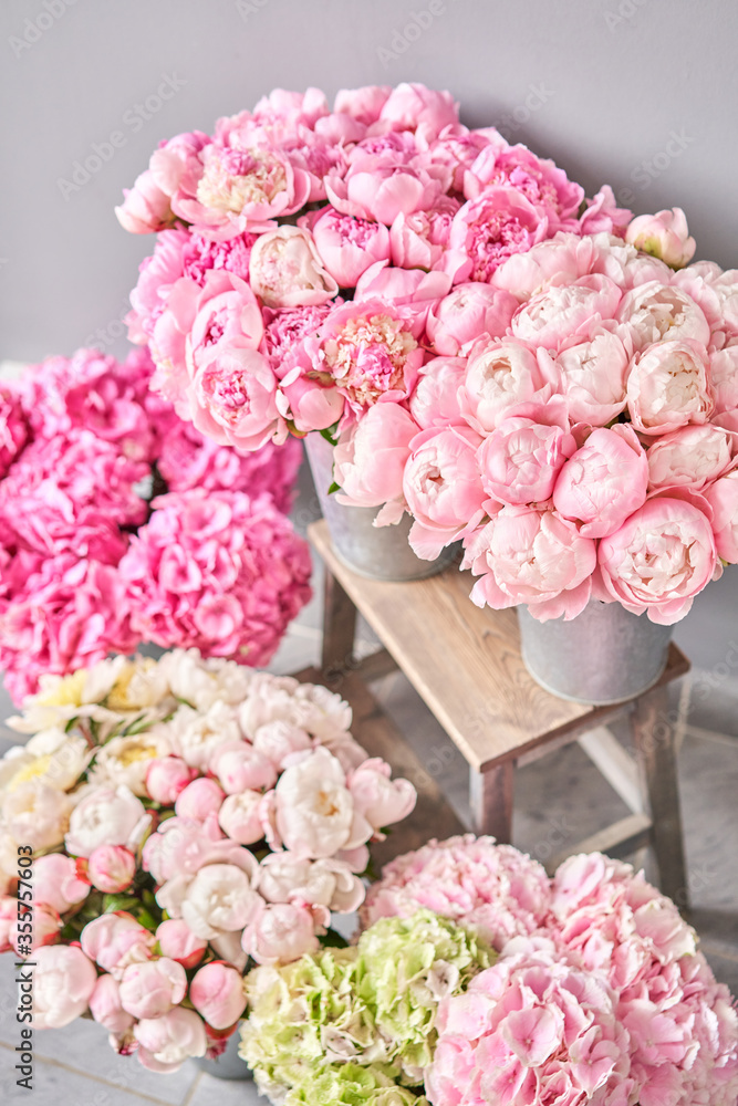 vases with peonies for Flowers delivery. Pink Angel Cheeks peonies in a  metal vase. Beautiful peony flower for catalog or online store. Floral shop  concept . Photos | Adobe Stock