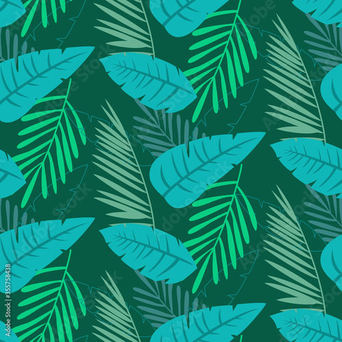 Tropical seamless pattern with palm tree leaves.