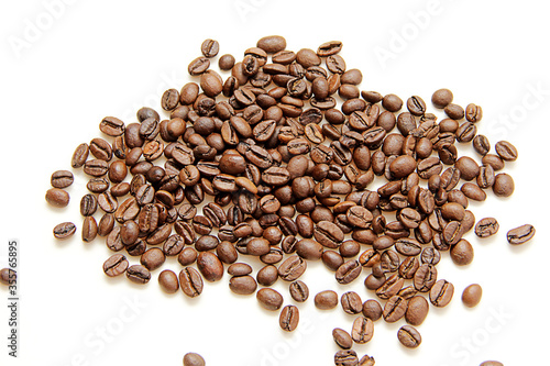 coffee beans are scattered on a white background