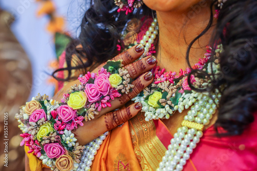 Indian Hindu Pre wedding Haldi ceremony hands and feet decorations close up