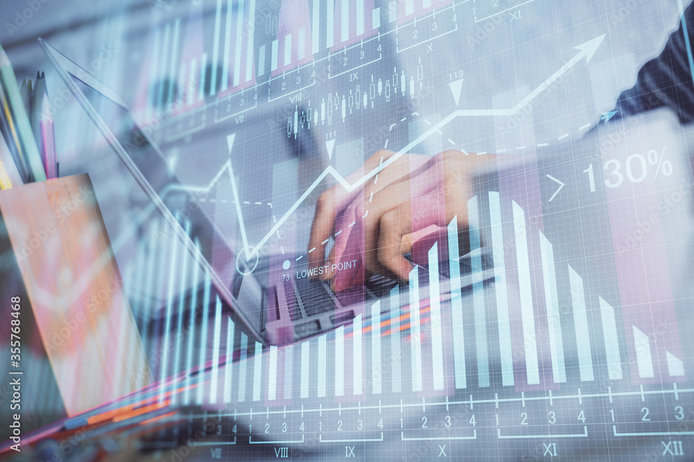 Double exposure of woman hands typing on computer and forex chart hologram drawing. Stock market invest concept. Double exposure of woman hands typing on computer and forex chart hologram drawing. Stock market invest concept.