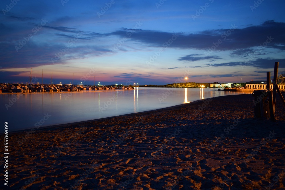 Obraz premium night seascape from the beach of Vada in Rosignano Marittimo in the province of Livorno, Tuscany Italy
