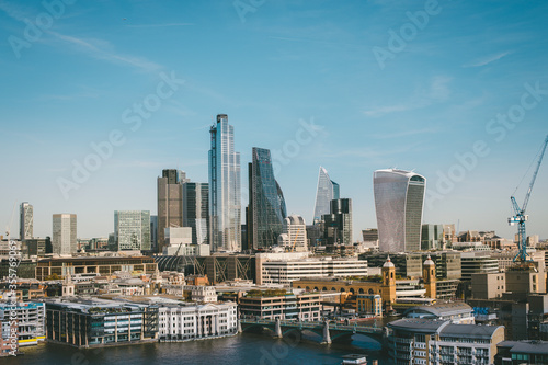 Cityscape skyline views of London with St Paul s Cathedral  the City of London  Canary Wharf  the Shard