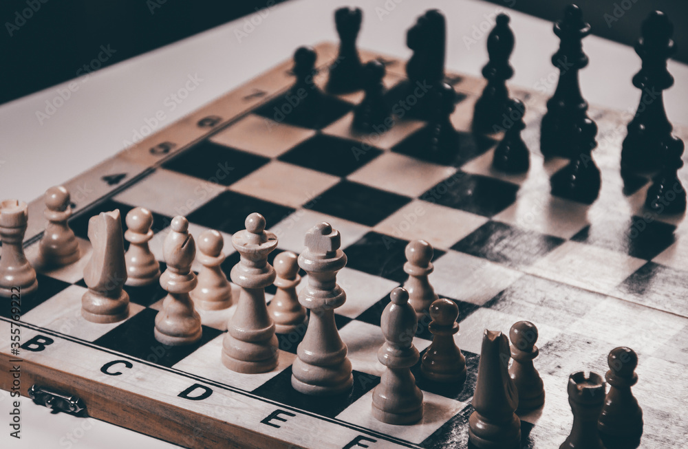 strategically playing chess with enemy player closeup figures