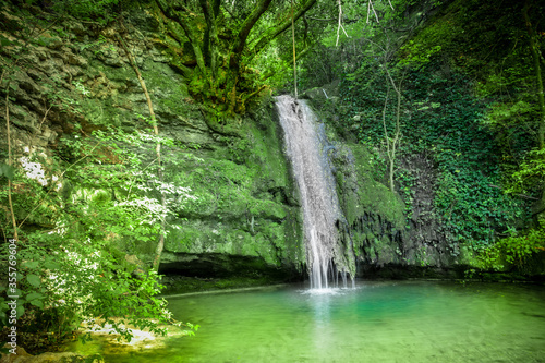 Long waterfall with water falling in long exposure