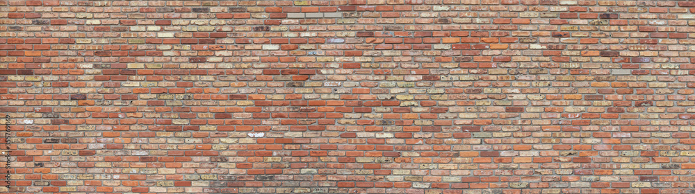 Old mixed red, brown,white bricks wall panorama Old mixed red, brown,white bricks wall panorama