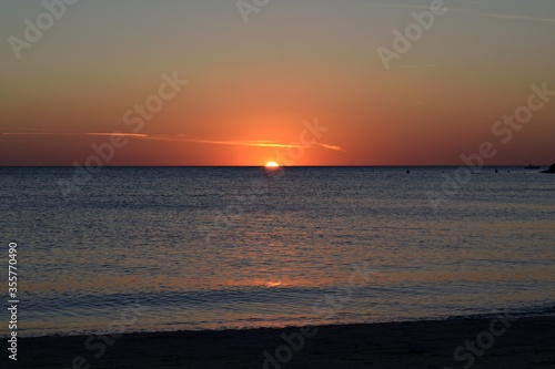 seascape at sunset time in the tourist resort of Vada in the municipality of Rosignano Marittimo on the Livorno coast in Tuscany, Italy