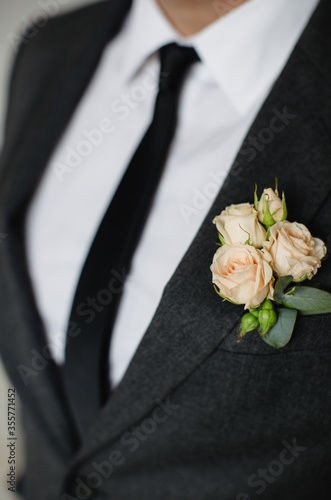 groom with rose