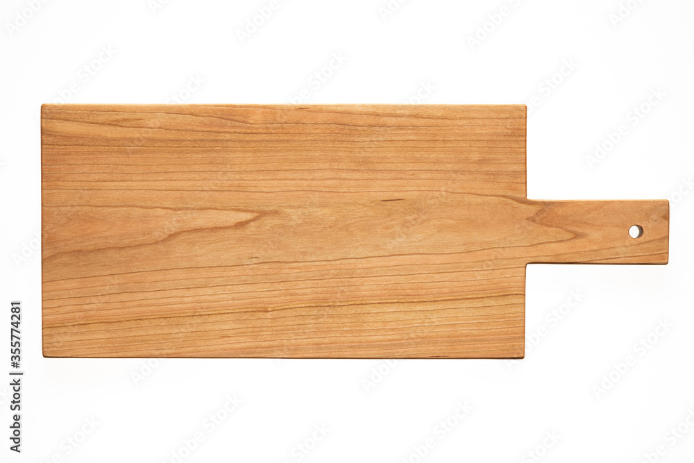 Handmade long cherry wooden board isolated on white background.