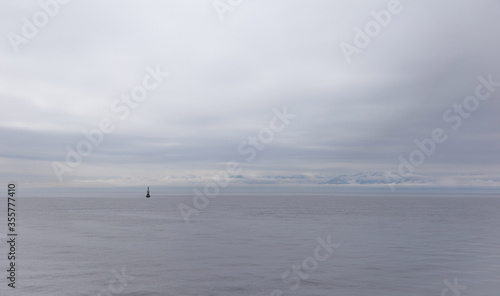 Rainy day at the Ogden Point breakwater district. A lone light feature stands  © Jeremy