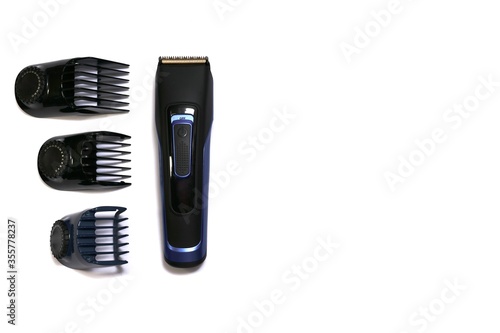 A haircut machine and three nozzles, side by side on a white background.
