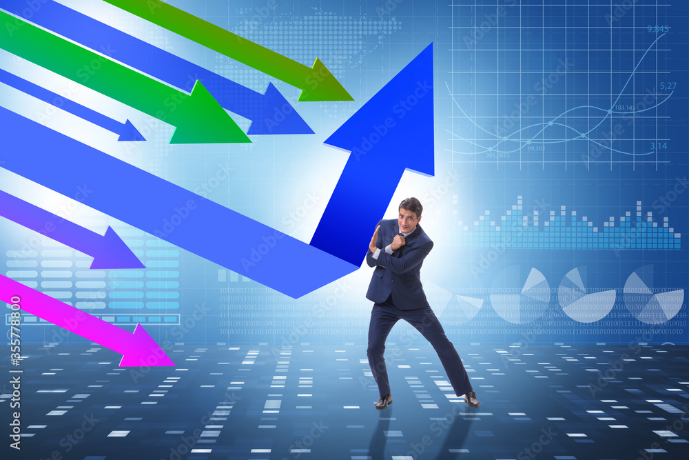Recovery concept with businessman and charts Recovery concept with businessman and charts
