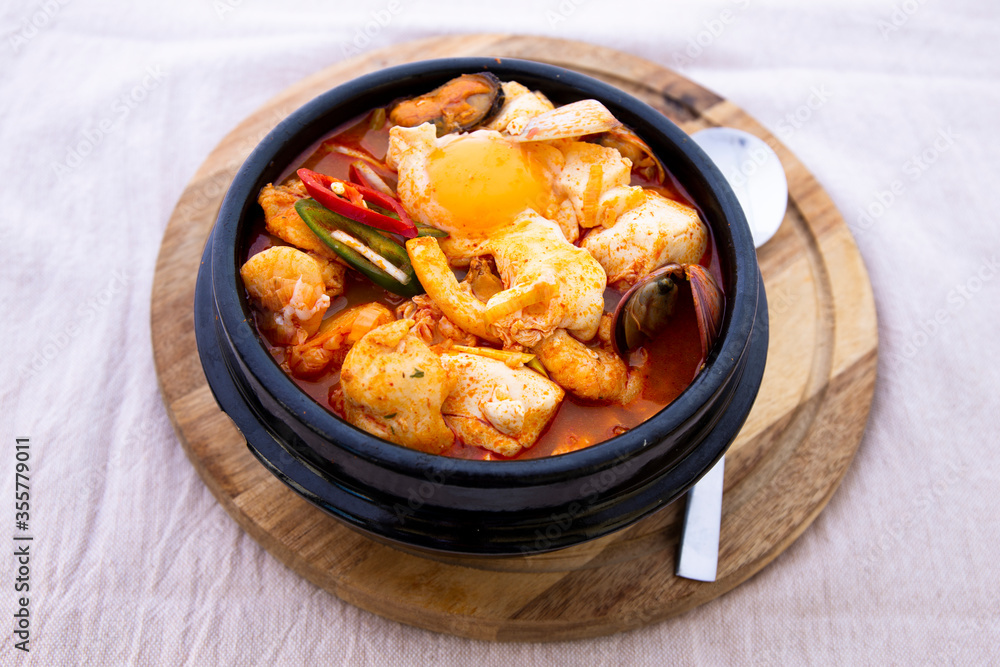 Korean spicy silken tofu stew with seafood Korean spicy silken tofu stew with seafood