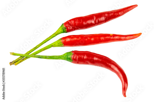 Red ripe chillies on a completely separate white background