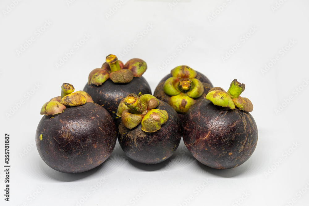 5 mangosteen isolated on a white background 5 mangosteen isolated on a white background