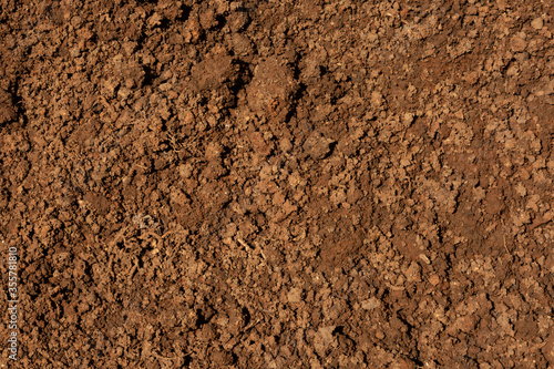 close up texture shot of loose soil on the groud photo