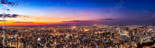 Foto Panoramic Night Cityscape View During Dusk Sunset From Water Tank Lookout in Bel