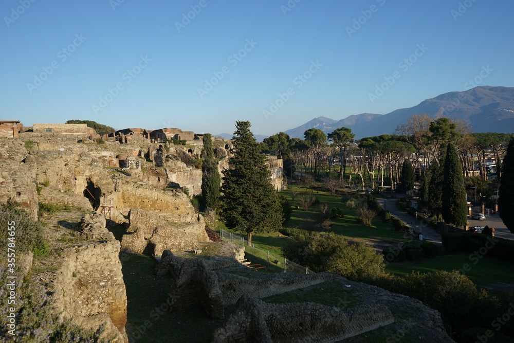 Courtyard of Ancient Pompeii ruins, UNESCO World Heritage Site, Campania region, Italy. Pompeii city destroyed in 79BC by the eruption of Mount Vesuvius