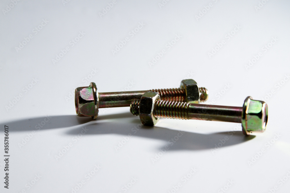 Fototapeta premium Metal screw on white background