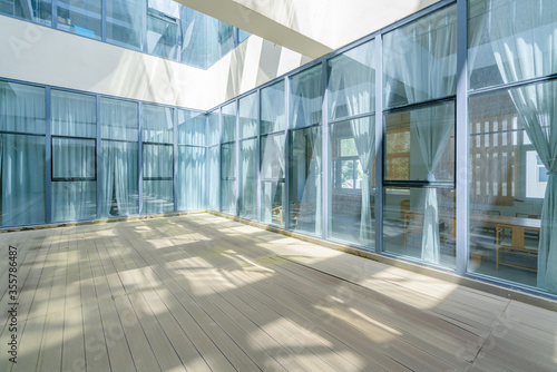 Interior space, glass windows and empty concrete floors