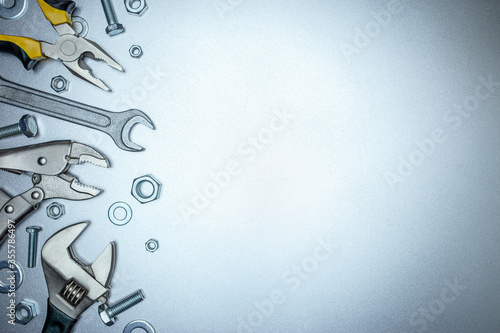 Φωτογραφία various renovation instruments and working tools on grey metal background