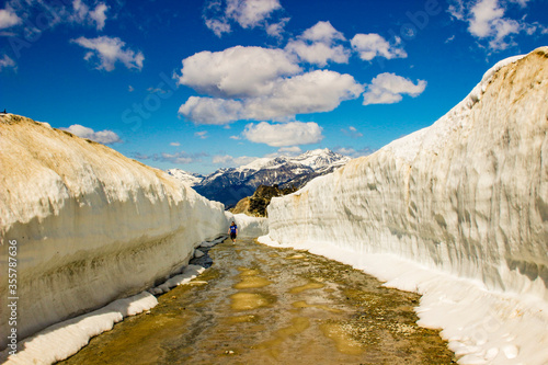 Summer snow walls in Whistler. Road through snow walls. Hiking i photo