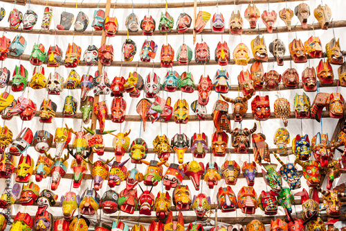 Wooden masks at the Mayan markets in Panajachel Guatemala