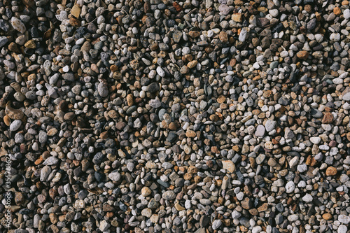 colourful Pebble shingle stones on path