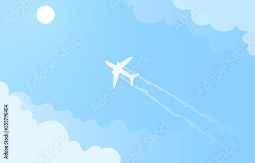 Flying plane in the blue sky.
