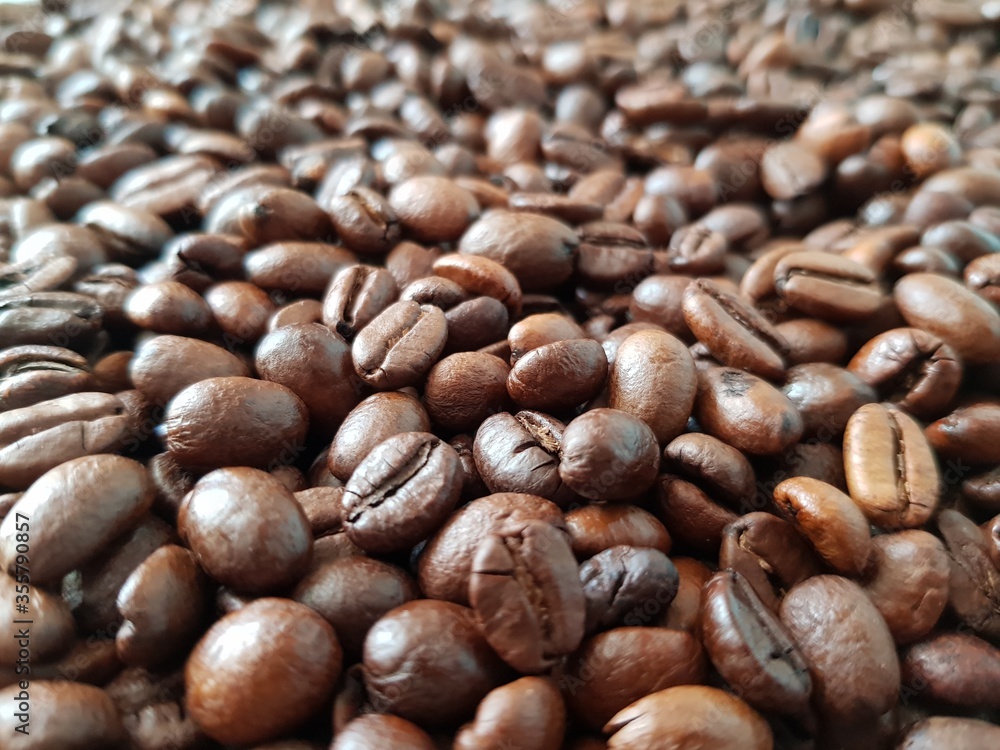 Coffee beans lie in bulk Coffee beans lie in bulk