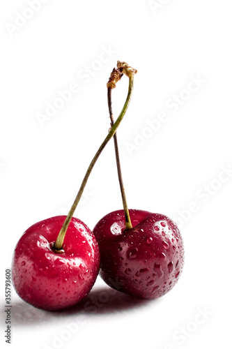 Wallpaper Mural red cherry berry macro with drops of water at white background, isolated Torontodigital.ca