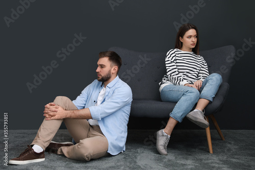 Unhappy couple with problems in relationship at home