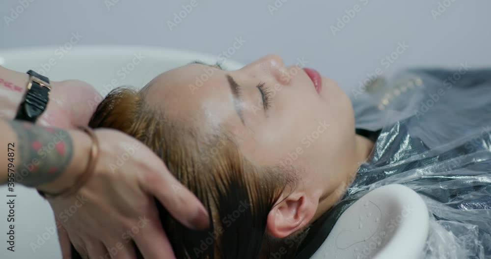 Woman dye her hair at beauty salon Woman dye her hair at beauty salon