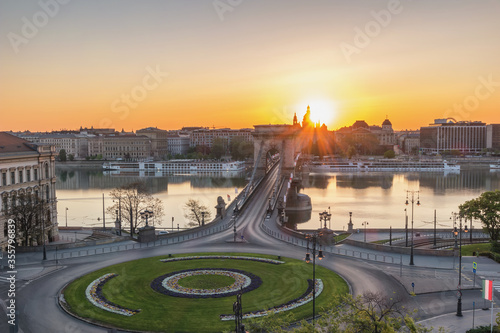 Budapest Hungary, city skyline sunrise at Danube River with Chain Bridge and St. Stephen's Basilica