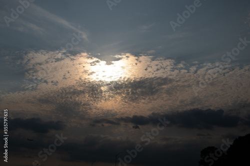 Sunset with clouds in the foreground