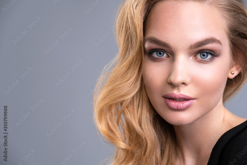Beautiful face of an attractive model with blue eyes. Woman with beauty long brown hair and natural makeup. Closeup portrait of a caucasian female. Attractive fashion model. Beauty face of a blonde Beautiful face of an attractive model with blue eyes. Woman with beauty long brown hair and natural makeup. Closeup portrait of a caucasian female. Attractive fashion model. Beauty face of a blonde