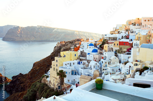 View of Fira town at the top of a cliff in Santorini, Greece.