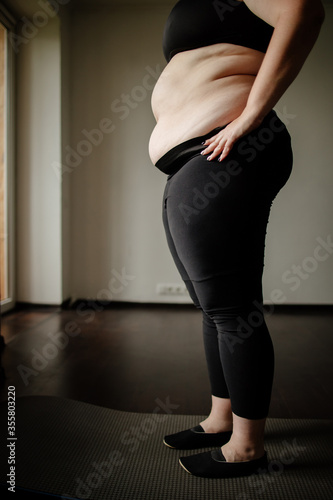 Konstfotografi Belly fat, excessive weight, overweight concept