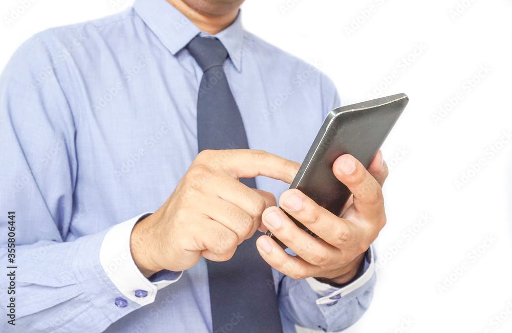 the businessman using a smartphone. the businessman using a smartphone.