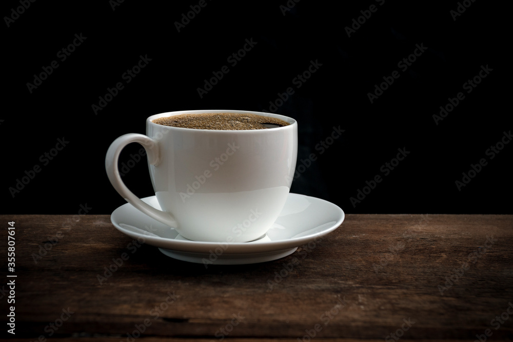 Cup of coffee on old wooden table Cup of coffee on old wooden table